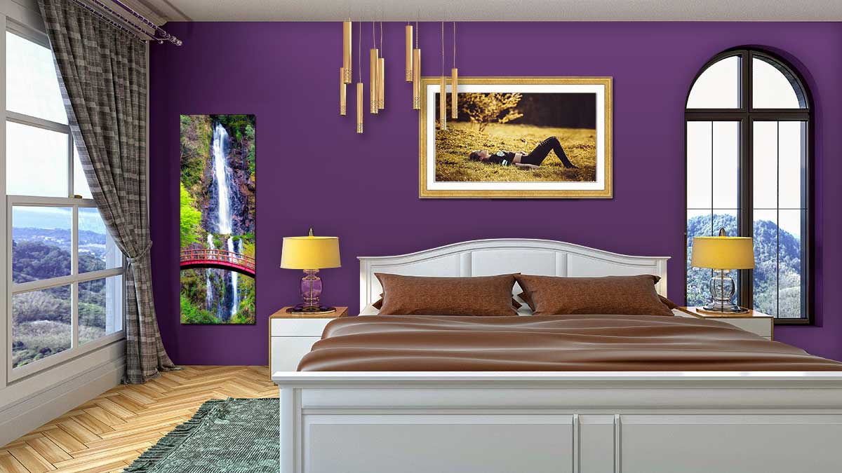Picture of the Scottish highlands printed and framed on a white brick wall